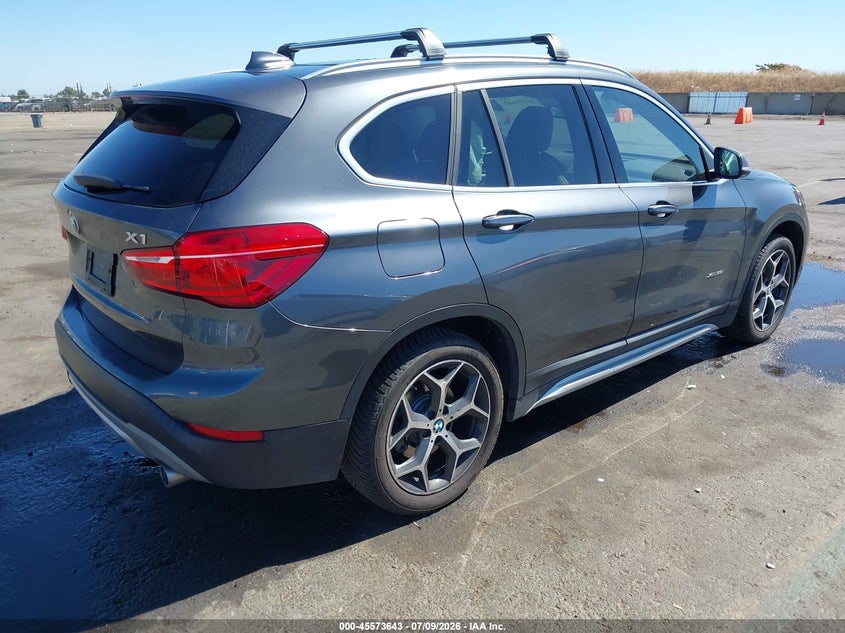 2018 BMW X1 VIN WBXHT3C33J5F91906 IAAI salvage auction — LEFT SIDE, Salvage Title, sold $2,350 on 2026-07-29 (photo 4)