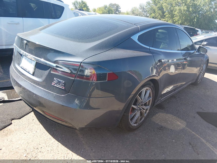 2017 Tesla Model s VIN 5YJSA1E4XHF199045 IAAI salvage auction — RIGHT SIDE, Salvage (Michigan), sold $9,400 on 2026-09-03 (photo 4)