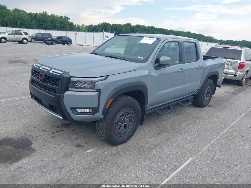 2026 Nissan Navara (frontier) VIN 1N6ED1EK6TN643452 IAAI salvage auction — SIDE, Salvage Title, sold $20,800 on 2026-09-10 (photo 2)