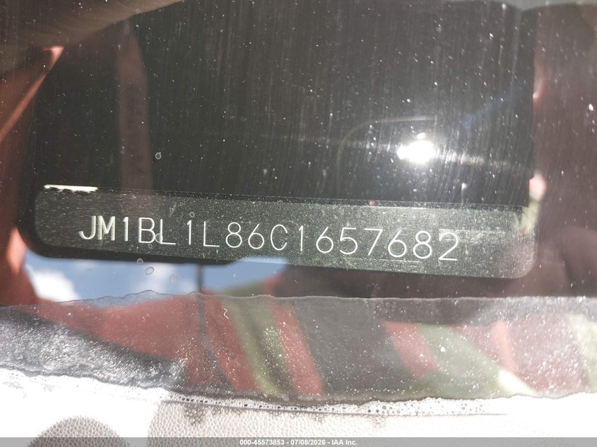 2012 Mazda 3 VIN JM1BL1L86C1657682 IAAI salvage auction — SIDE, Original (Texas), sold $1,450 on 2026-08-27 (photo 9)