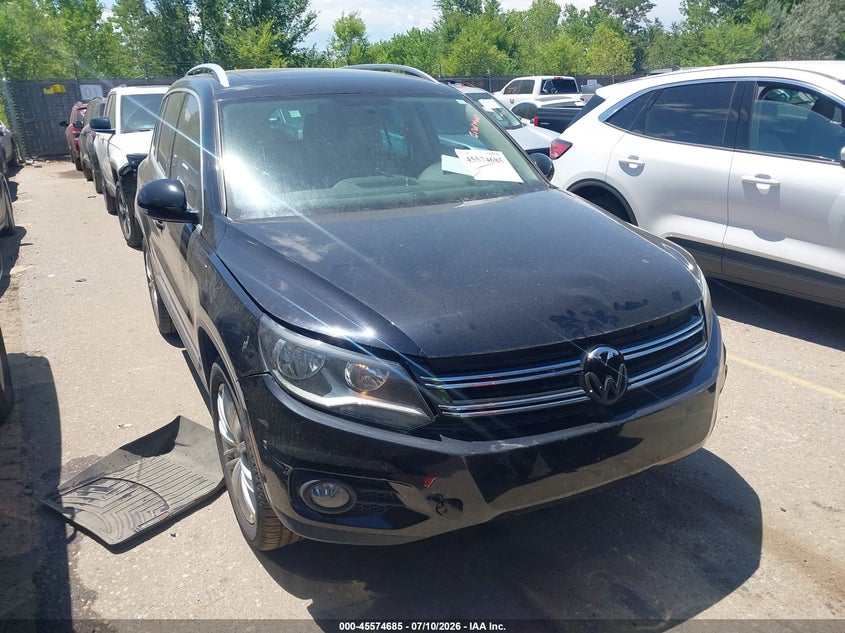 2014 Volkswagen Tiguan VIN WVGAV3AX1EW562265 IAAI salvage auction — NORMAL WEAR, Clear (Colorado), sold $1,575 on 2026-07-28 (photo 1)