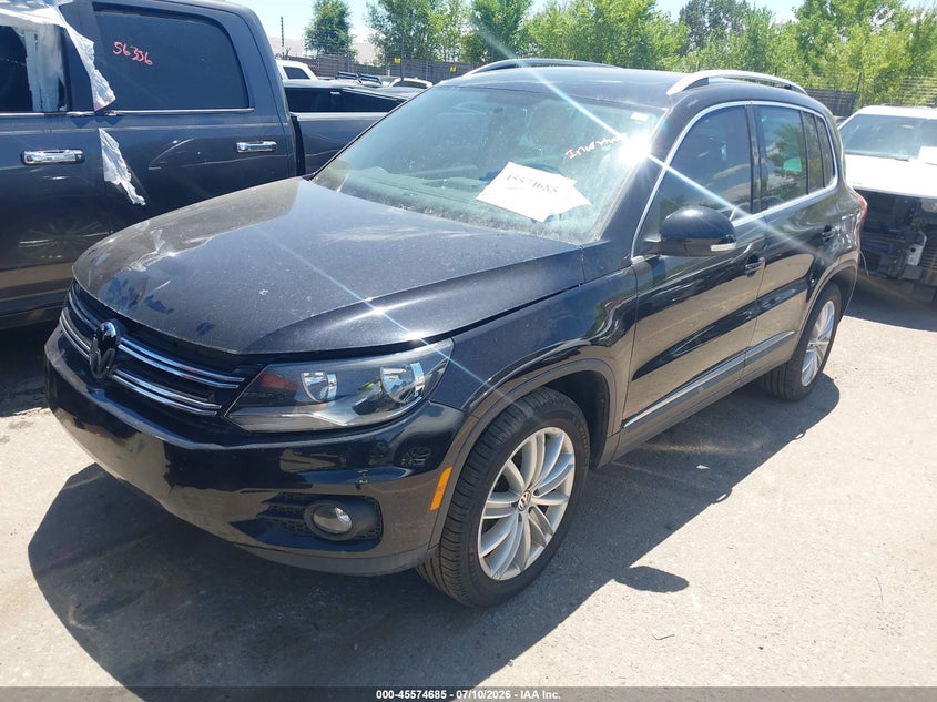 2014 Volkswagen Tiguan VIN WVGAV3AX1EW562265 IAAI salvage auction — NORMAL WEAR, Clear (Colorado), sold $1,575 on 2026-07-28 (photo 2)