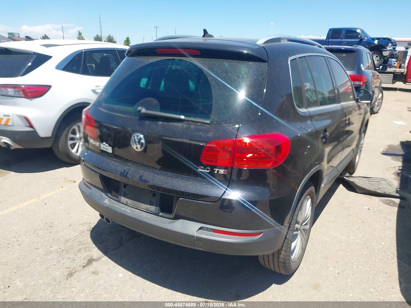 2014 Volkswagen Tiguan VIN WVGAV3AX1EW562265 IAAI salvage auction — NORMAL WEAR, Clear (Colorado), sold $1,575 on 2026-07-28 (photo 4)