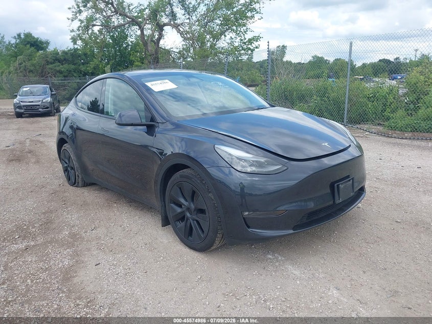 2024 Tesla Model y VIN 7SAYGAEE7RF200674 IAAI salvage auction — SIDE, Salvage Title, sold $11,300 on 2026-07-21 (photo 1)