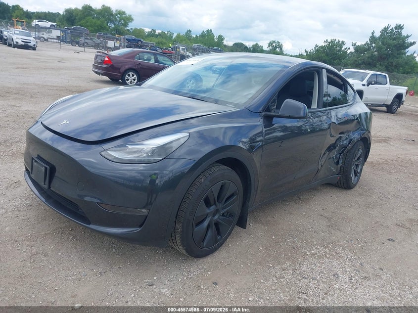 2024 Tesla Model y VIN 7SAYGAEE7RF200674 IAAI salvage auction — SIDE, Salvage Title, sold $11,300 on 2026-07-21 (photo 2)