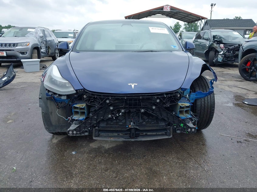 2023 Tesla Model 3 VIN 5YJ3E1EC0PF586489 IAAI salvage auction — FRONT END, Salvage Title, sold $11,600 on 2026-10-04 (photo 6)