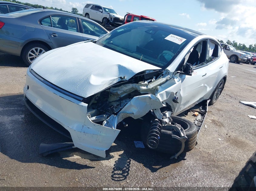 2026 Tesla Model y VIN 7SAYGDED0TA716095 IAAI salvage auction — SIDE, Wait Title, sold $10,700 on 2026-08-29 (photo 2)