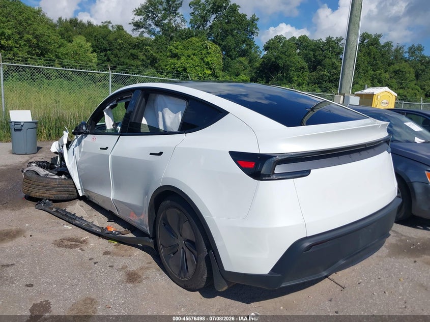 2026 Tesla Model y VIN 7SAYGDED0TA716095 IAAI salvage auction — SIDE, Wait Title, sold $10,700 on 2026-08-29 (photo 3)
