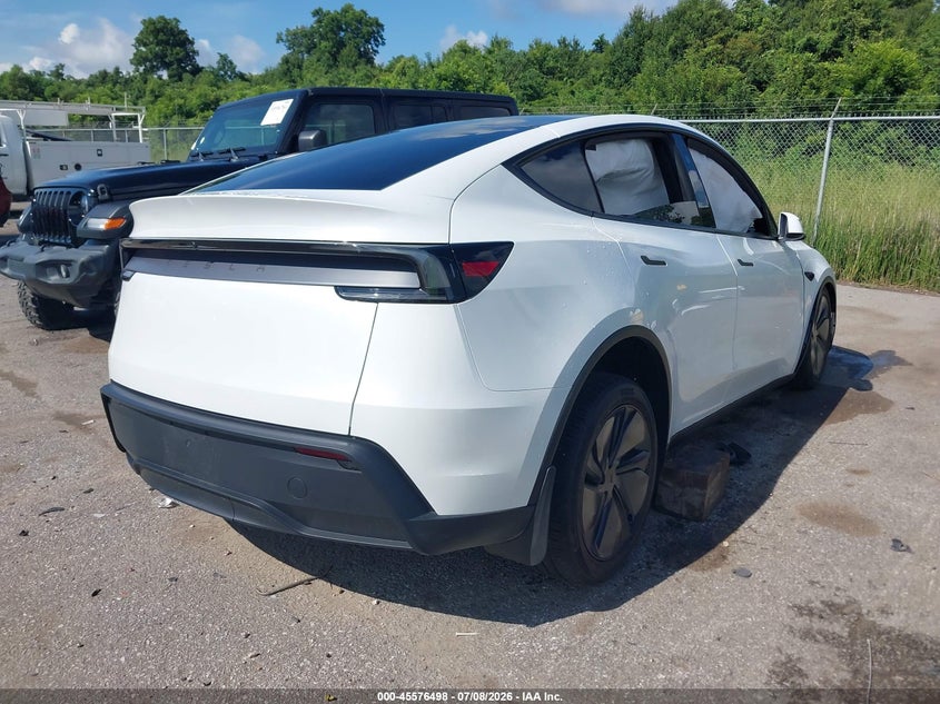 2026 Tesla Model y VIN 7SAYGDED0TA716095 IAAI salvage auction — SIDE, Wait Title, sold $10,700 on 2026-08-29 (photo 4)