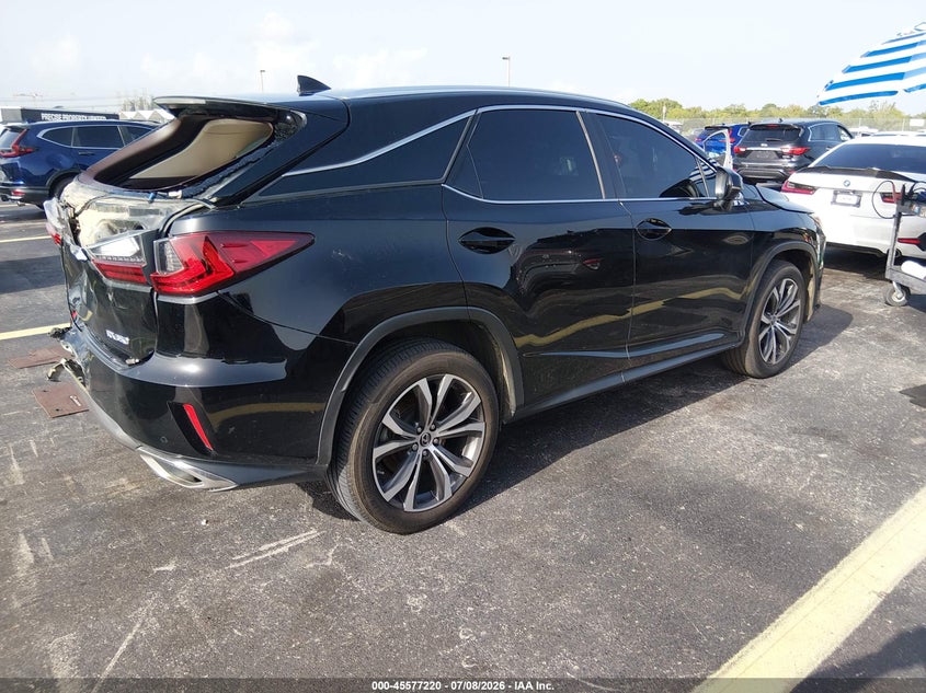 2019 Lexus Rx VIN 2T2ZZMCA1KC148381 IAAI salvage auction — REAR END, Salvage Title, sold $13,800 on 2026-09-10 (photo 4)
