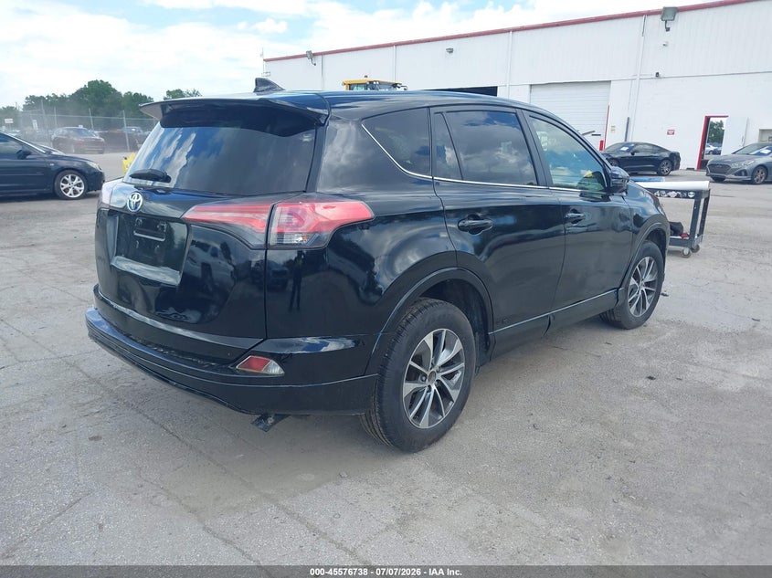 2018 Toyota Rav 4 VIN JTMRJREV0JD222206 IAAI salvage auction — REAR END, Salvage Title, sold $4,550 on 2026-07-29 (photo 4)