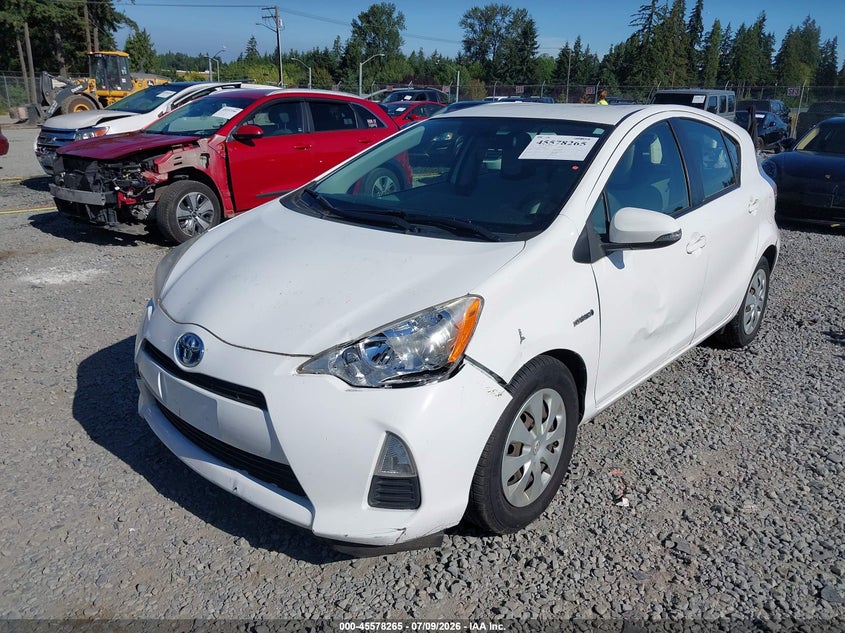 2013 Toyota Prius c VIN JTDKDTB35D1539901 IAAI salvage auction — LEFT SIDE, Salvage Title, sold $2,000 on 2026-07-30 (photo 2)