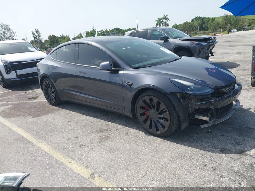 2022 Tesla Model 3 VIN 5YJ3E1EC0NF193895 IAAI salvage auction — LEFT FRONT, Rebuildable (Florida), sold $8,000 on 2026-07-30 (photo 1)