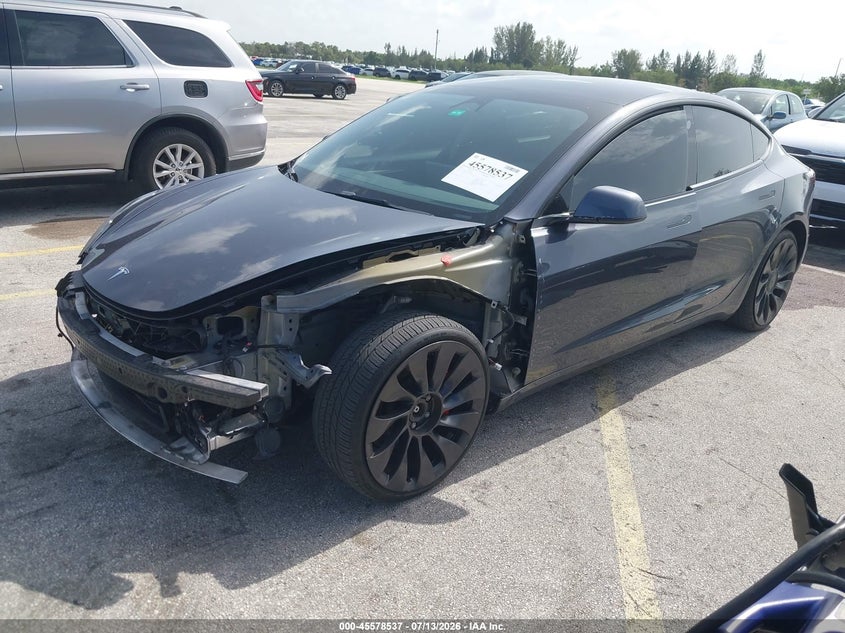 2022 Tesla Model 3 VIN 5YJ3E1EC0NF193895 IAAI salvage auction — LEFT FRONT, Rebuildable (Florida), sold $8,000 on 2026-07-30 (photo 2)