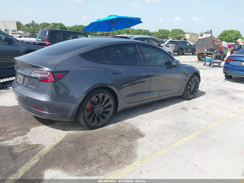 2022 Tesla Model 3 VIN 5YJ3E1EC0NF193895 IAAI salvage auction — LEFT FRONT, Rebuildable (Florida), sold $8,000 on 2026-07-30 (photo 4)