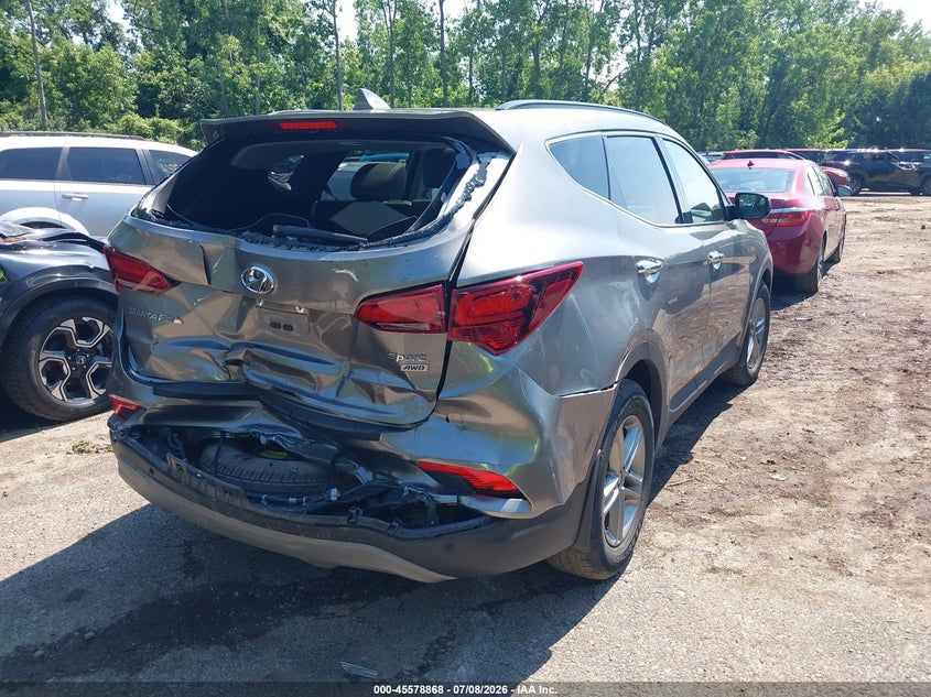 2018 Hyundai Santa fe VIN 5XYZUDLBXJG561110 IAAI salvage auction — REAR END, Salvage (Ohio), sold $3,250 on 2026-07-31 (photo 4)