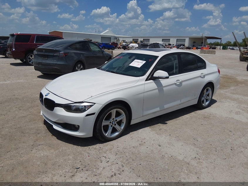 2014 BMW 3 series VIN WBA3A5C57EP602002 IAAI salvage auction — NORMAL WEAR, Original (Texas), sold $650 on 2026-08-12 (photo 2)