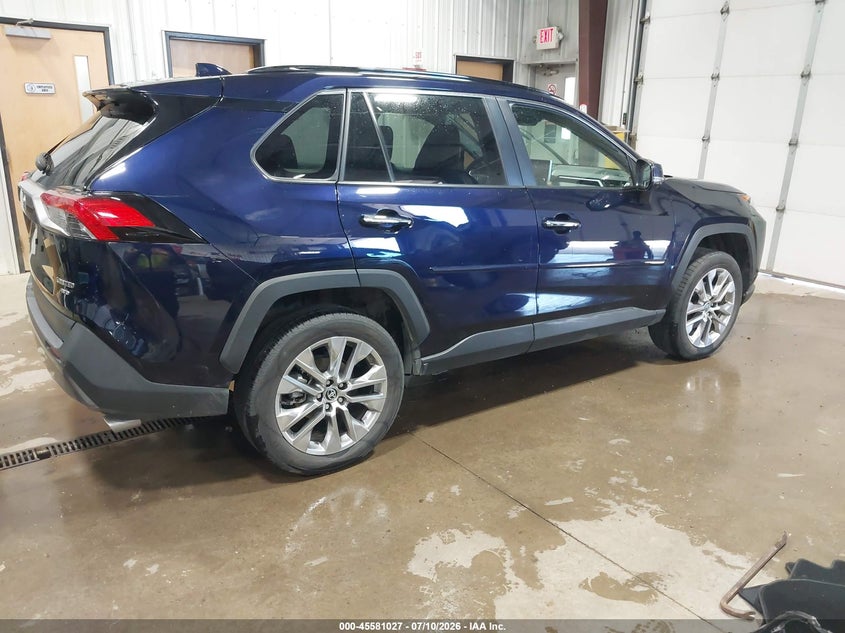 2021 Toyota Rav 4 VIN JTMN1RFV3MD073307 IAAI salvage auction — LEFT SIDE, Salvage Title, sold $13,750 on 2026-08-29 (photo 4)