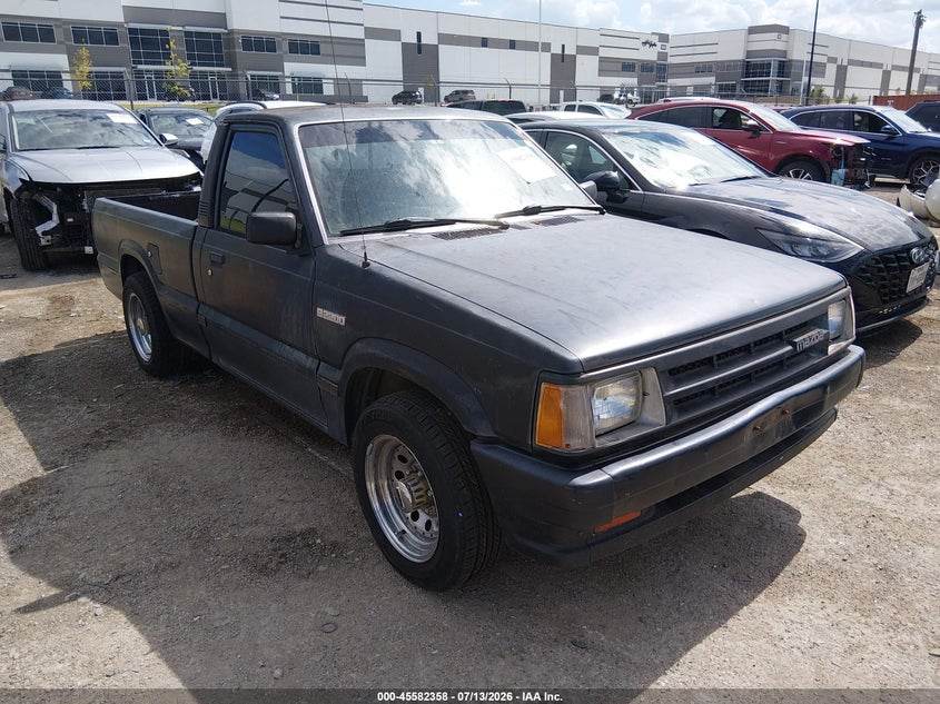 1988 Mazda B series VIN JM2UF1132J0370104 IAAI salvage auction — NORMAL WEAR, Clear, sold $175 on 2026-07-21 (photo 1)