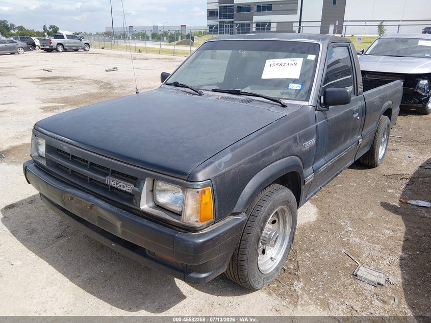 1988 Mazda B series VIN JM2UF1132J0370104 IAAI salvage auction — NORMAL WEAR, Clear, sold $175 on 2026-07-21 (photo 2)