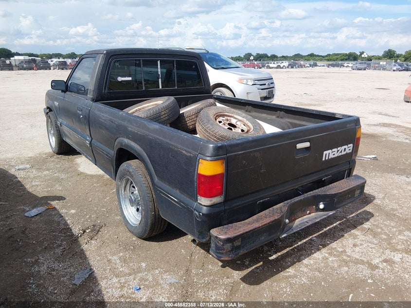 1988 Mazda B series VIN JM2UF1132J0370104 IAAI salvage auction — NORMAL WEAR, Clear, sold $175 on 2026-07-21 (photo 3)