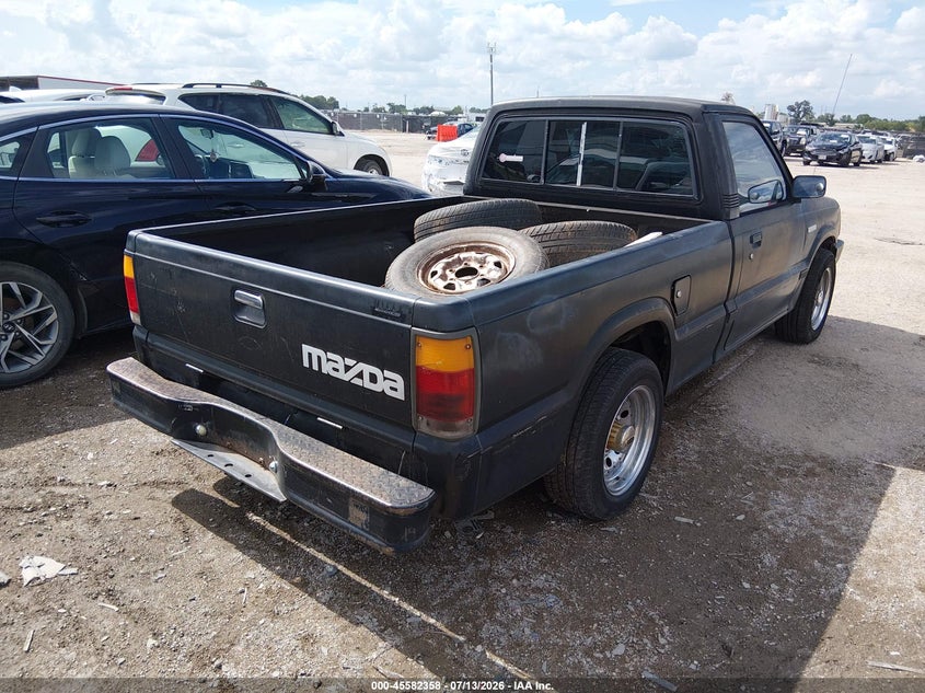 1988 Mazda B series VIN JM2UF1132J0370104 IAAI salvage auction — NORMAL WEAR, Clear, sold $175 on 2026-07-21 (photo 4)