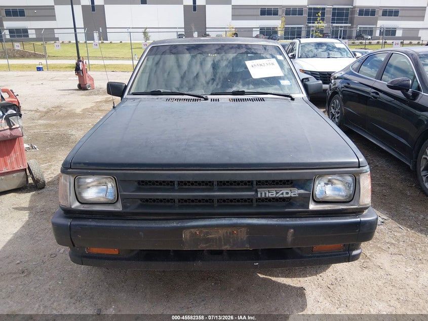 1988 Mazda B series VIN JM2UF1132J0370104 IAAI salvage auction — NORMAL WEAR, Clear, sold $175 on 2026-07-21 (photo 6)