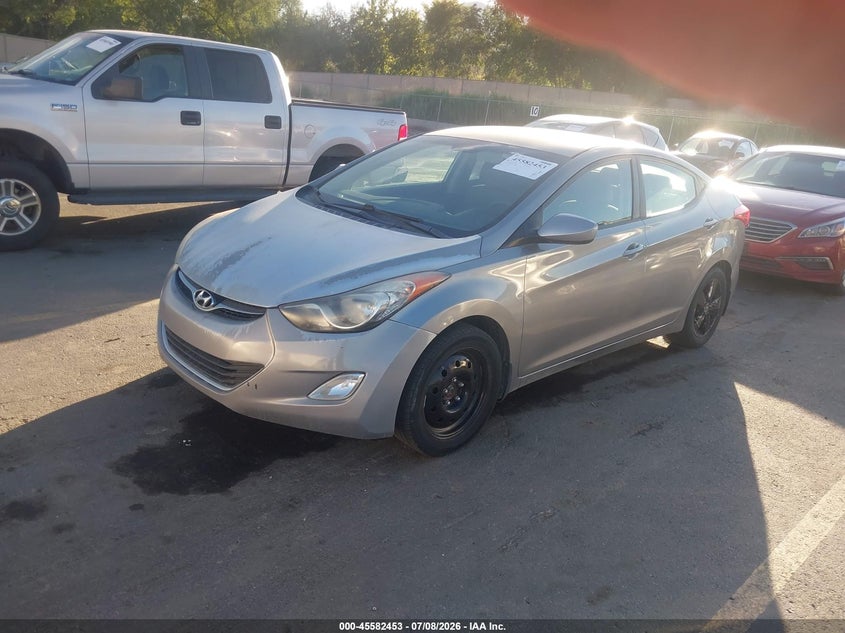 2013 Hyundai Elantra VIN KMHDH4AE6DU948859 IAAI salvage auction — NORMAL WEAR, Rebuilt/Restored (Utah), sold $350 on 2026-07-30 (photo 2)