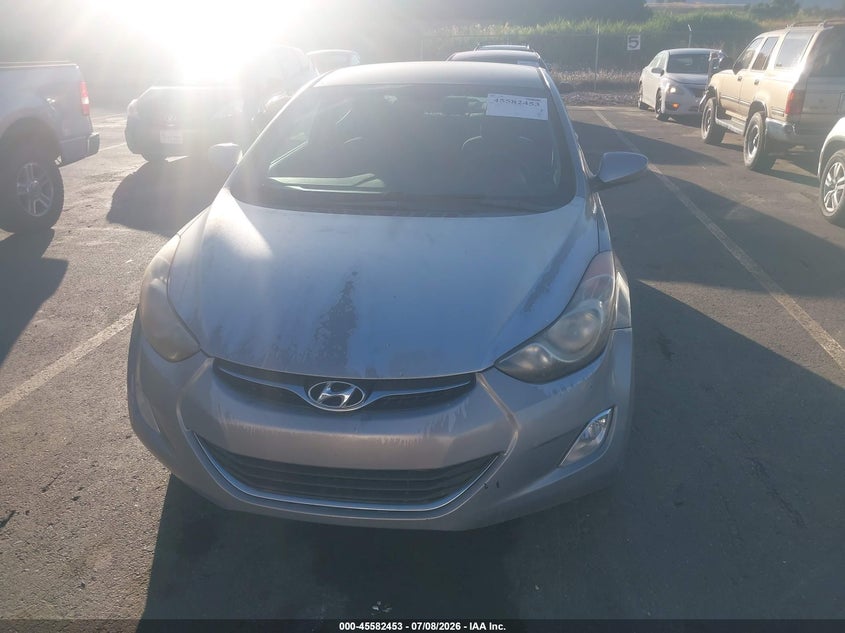 2013 Hyundai Elantra VIN KMHDH4AE6DU948859 IAAI salvage auction — NORMAL WEAR, Rebuilt/Restored (Utah), sold $350 on 2026-07-30 (photo 6)