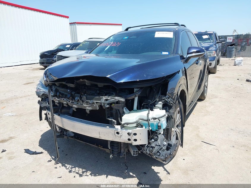 2023 Lexus Rx VIN JTJCHMAA6P2010130 IAAI salvage auction — FRONT END, Salvage (Texas), sold $17,150 on 2026-09-11 (photo 2)