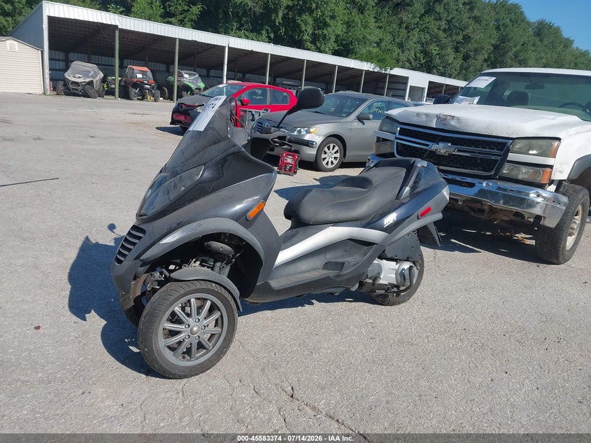 2007 Piaggio Mp3 VIN ZAPM479M975002006 IAAI salvage auction — NORMAL WEAR, Clear (Kansas), sold $225 on 2026-07-22 (photo 2)