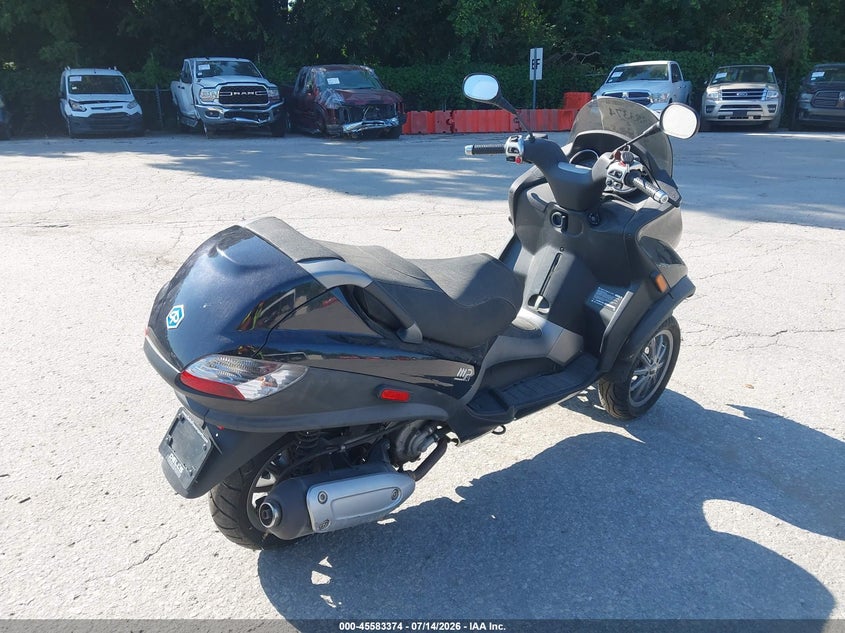 2007 Piaggio Mp3 VIN ZAPM479M975002006 IAAI salvage auction — NORMAL WEAR, Clear (Kansas), sold $225 on 2026-07-22 (photo 4)