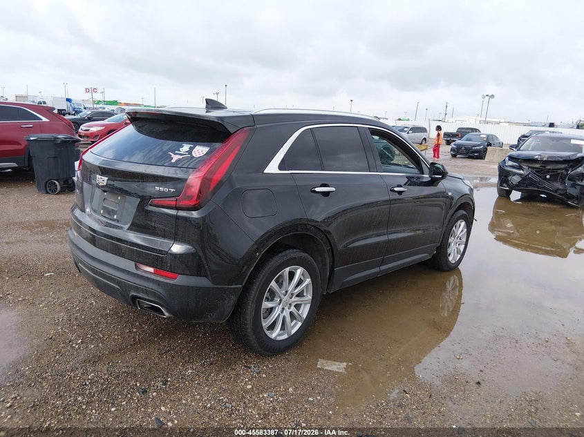 2021 Cadillac Xt4 VIN 1GYAZAR43MF022996 IAAI salvage auction — LEFT SIDE, Original (Texas), sold $7,050 on 2026-08-26 (photo 4)