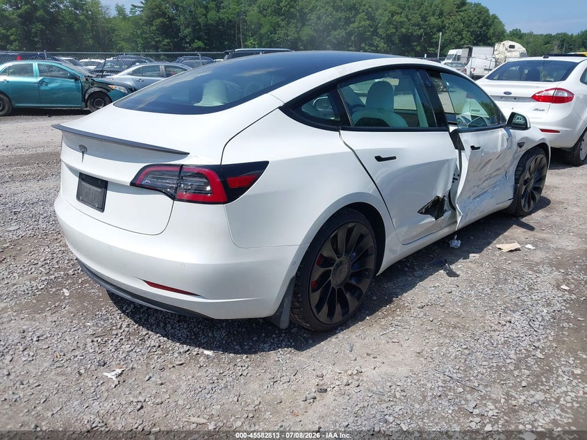 2021 Tesla Model 3 VIN 5YJ3E1EC8MF973335 IAAI salvage auction — RIGHT FRONT, Salvage Title, sold $1,300 on 2026-07-30 (photo 4)