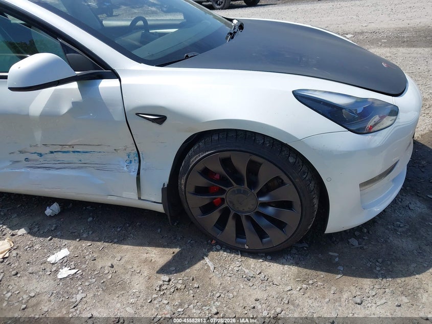 2021 Tesla Model 3 VIN 5YJ3E1EC8MF973335 IAAI salvage auction — RIGHT FRONT, Salvage Title, sold $1,300 on 2026-07-30 (photo 6)