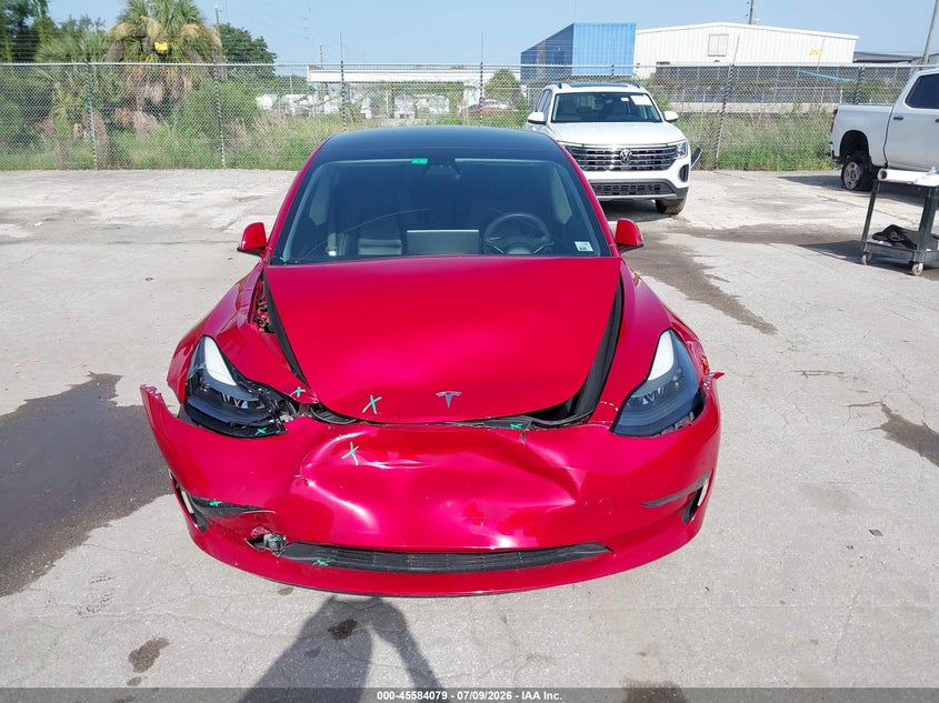 2022 Tesla Model 3 VIN 5YJ3E1EB3NF126991 IAAI salvage auction — FRONT END, Rebuildable (Florida), sold $6,800 on 2026-07-30 (photo 6)