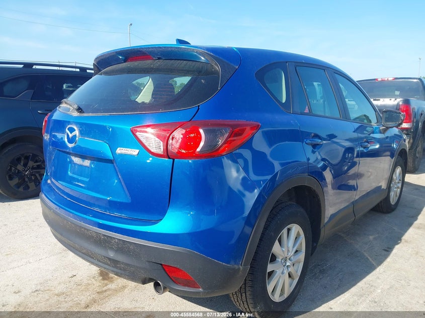 2014 Mazda Cx-5 VIN JM3KE2BE1E0301969 IAAI salvage auction — NORMAL WEAR, Original (Ohio), sold $25 on 2026-07-21 (photo 4)