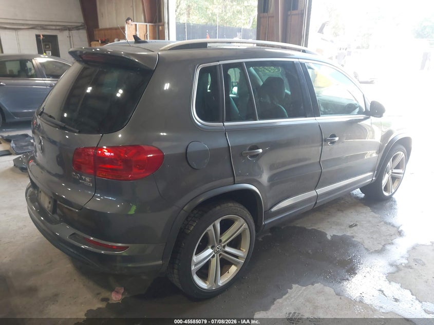 2015 Volkswagen Tiguan VIN WVGBV7AX8FW089199 IAAI salvage auction — NORMAL WEAR, Clear (New York), sold $400 on 2026-07-15 (photo 4)
