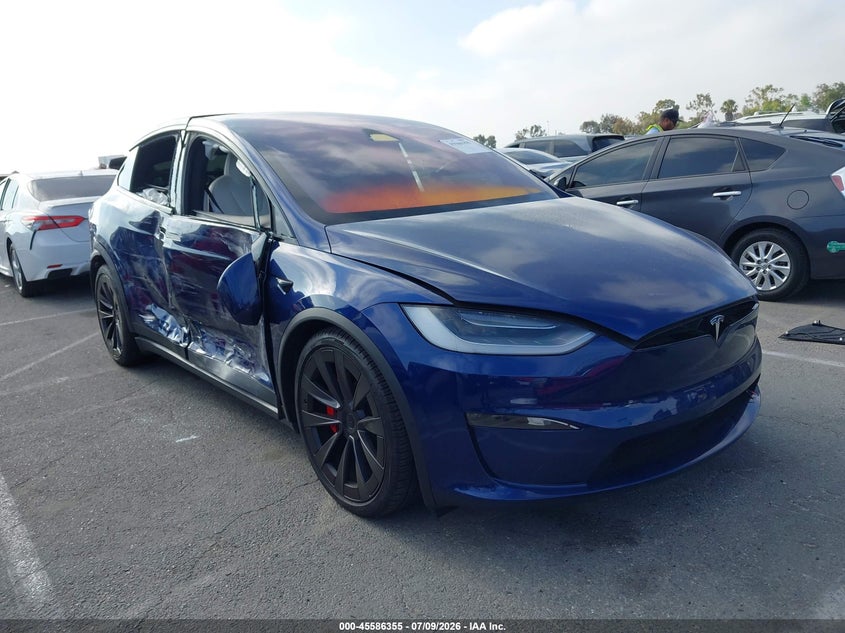 2023 Tesla Model x VIN 7SAXCBE69PF396099 — IAAI salvage auction photo