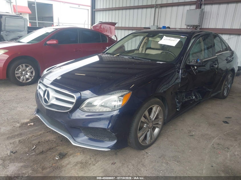 2016 Mercedes-benz E-klasse VIN WDDHF5KB4GB301310 IAAI salvage auction — LEFT SIDE, Rebuildable (Florida), sold $1,650 on 2026-08-18 (photo 2)