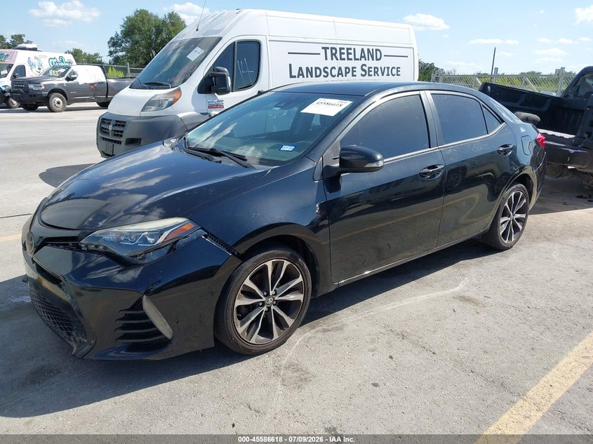 2018 Toyota Corolla VIN 5YFBURHE6JP821869 IAAI salvage auction — NORMAL WEAR, Clear (Texas), sold $2,025 on 2026-07-16 (photo 2)