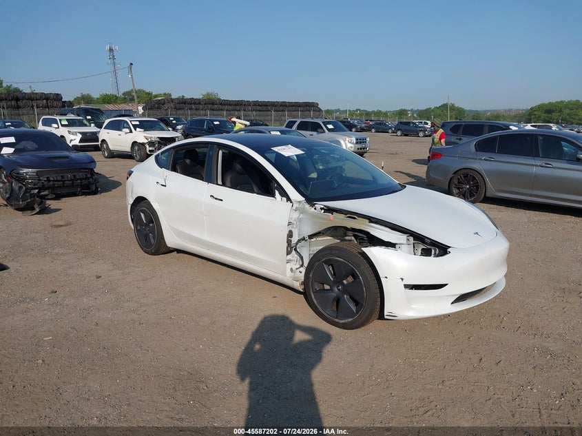 2023 Tesla Model 3 VIN 5YJ3E1EAXPF403940 — IAAI salvage auction photo