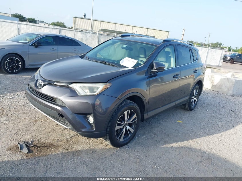 2016 Toyota Rav 4 VIN JTMWFREV7GJ094903 IAAI salvage auction — RIGHT SIDE, Rebuildable (Florida), sold $2,050 on 2026-07-28 (photo 2)
