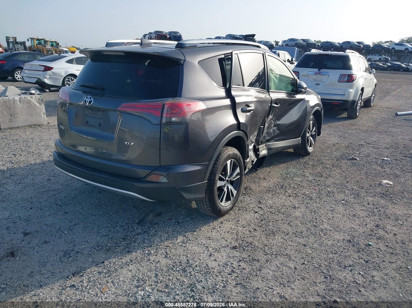 2016 Toyota Rav 4 VIN JTMWFREV7GJ094903 IAAI salvage auction — RIGHT SIDE, Rebuildable (Florida), sold $2,050 on 2026-07-28 (photo 4)
