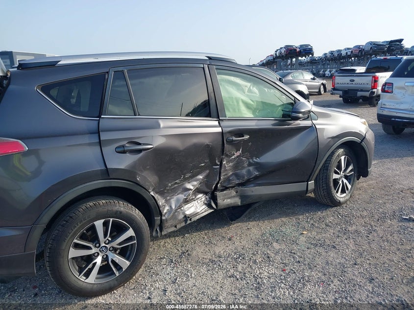 2016 Toyota Rav 4 VIN JTMWFREV7GJ094903 IAAI salvage auction — RIGHT SIDE, Rebuildable (Florida), sold $2,050 on 2026-07-28 (photo 6)