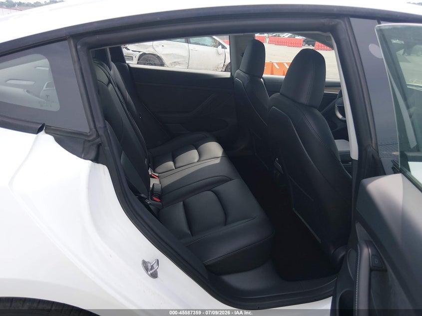 2023 Tesla Model 3 VIN 5YJ3E1EA1PF511346 IAAI salvage auction — FRONT & REAR, Salvage Title, sold $8,600 on 2026-10-03 (photo 8)