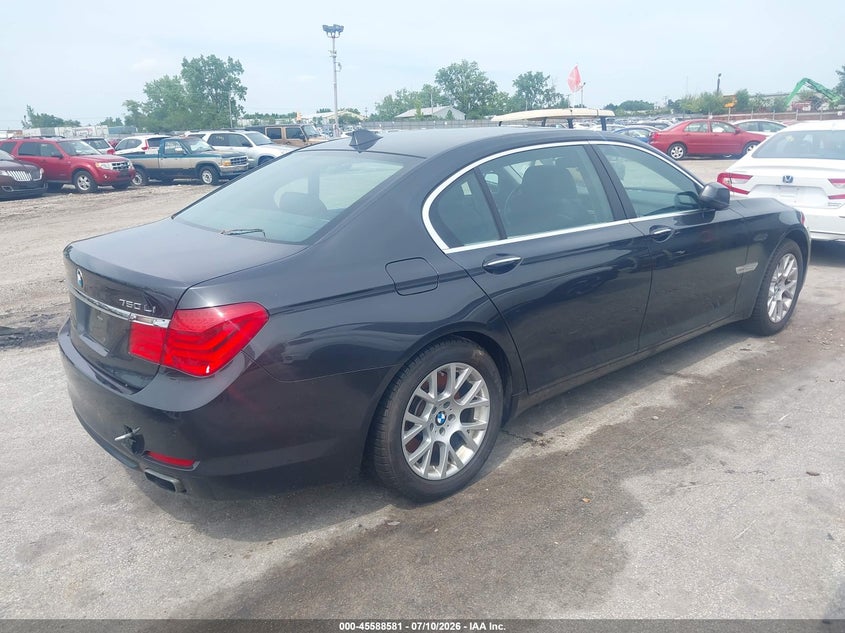 2012 BMW 7er VIN WBAKC8C51CC437074 IAAI salvage auction — NORMAL WEAR, Clear (Illinois), sold $975 on 2026-07-29 (photo 4)
