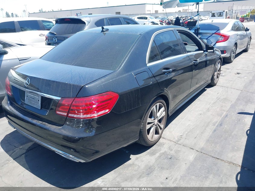 2014 Mercedes-benz E-klasse VIN WDDHF5KB1EB038948 IAAI salvage auction — ENGINE DAMAGE, Salvage Title, sold $2,850 on 2026-07-22 (photo 4)