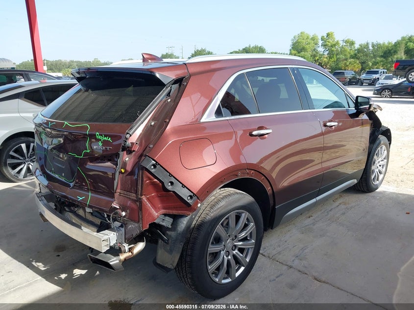2023 Cadillac Xt4 VIN 1GYFZCR46PF101018 IAAI salvage auction — FRONT & REAR, Rebuildable (Florida), sold $2,750 on 2026-08-02 (photo 4)