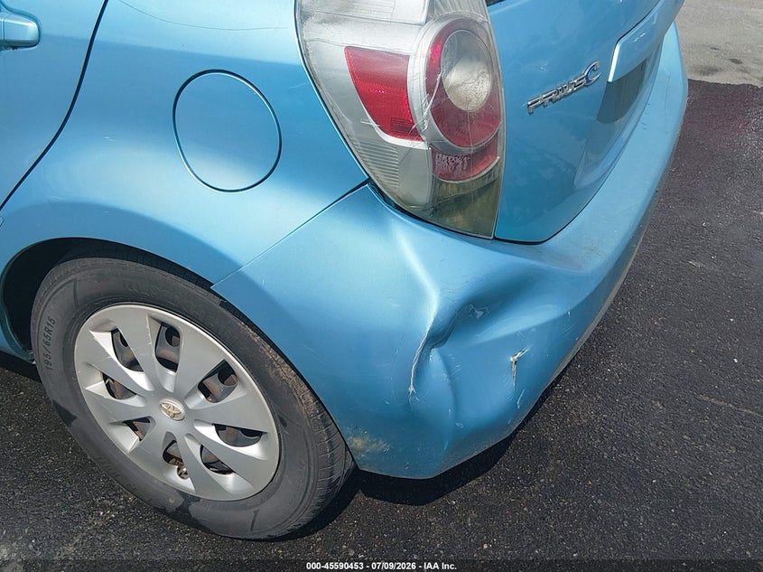 2014 Toyota Prius c VIN JTDKDTB36E1085885 IAAI salvage auction — NORMAL WEAR, Salvage Title, sold $375 on 2026-07-29 (photo 6)